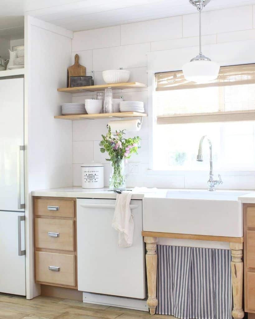 french country kitchen white apron sink wood wall shelves 