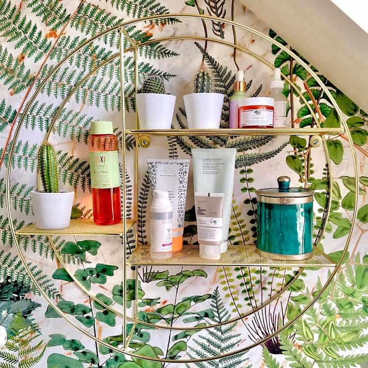 unique bathroom gold shelf with plant wallpaper