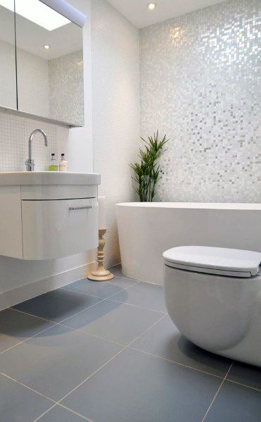 freestanding bathtub and toilet