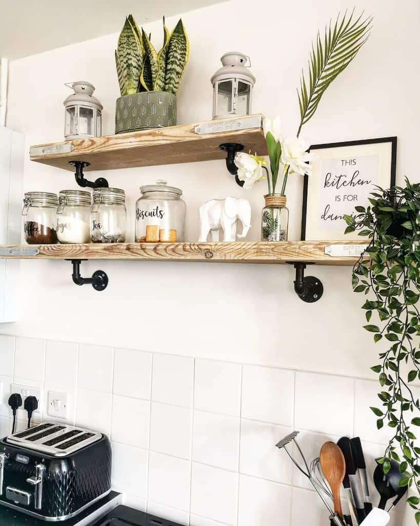 floating wood shelves with black pipe brackets