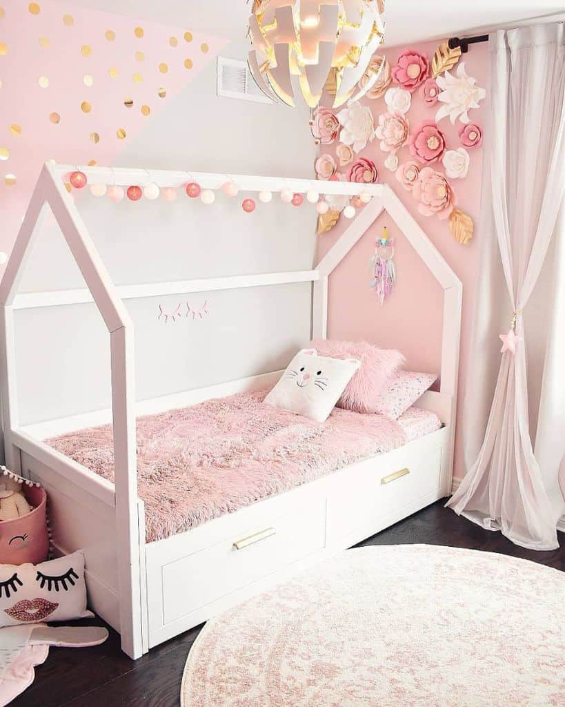 girls pink bedroom white canopy bed with underneath draws