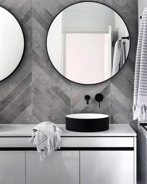 herringbone-patterned grey tiles 