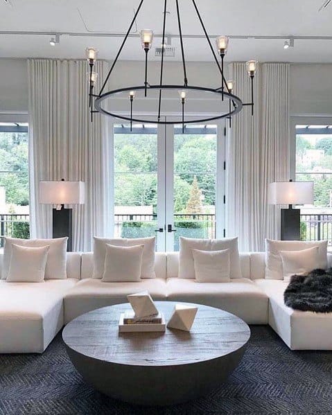 modern luxury living room with white sofa and chandelier