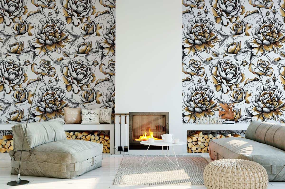 luxury living room with floral wallpaper and fireplace 