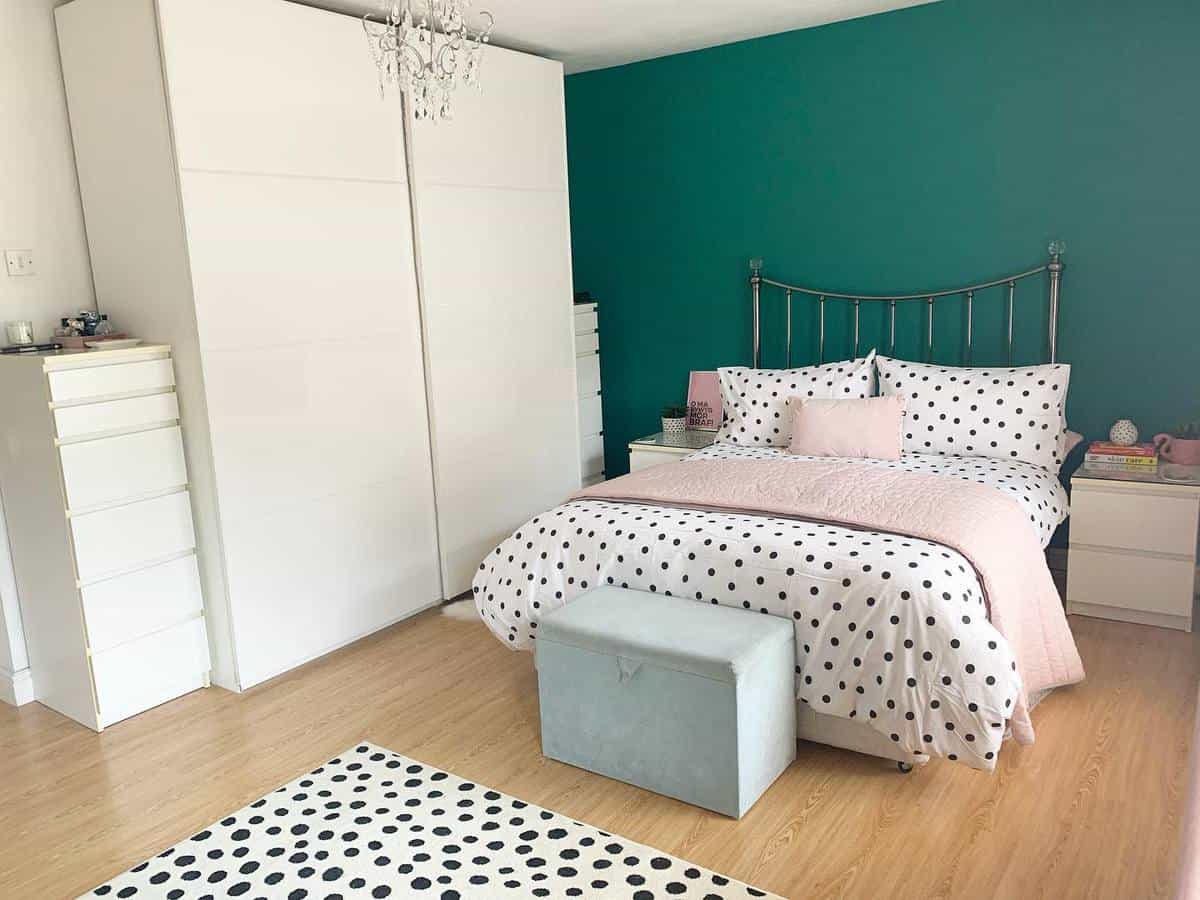 dark green accent wall girls bedroom white cabinets wardrobe 