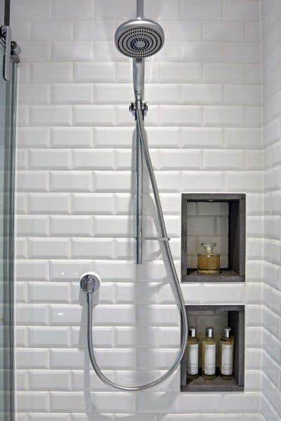 modern white tile shower with recessed shelf 