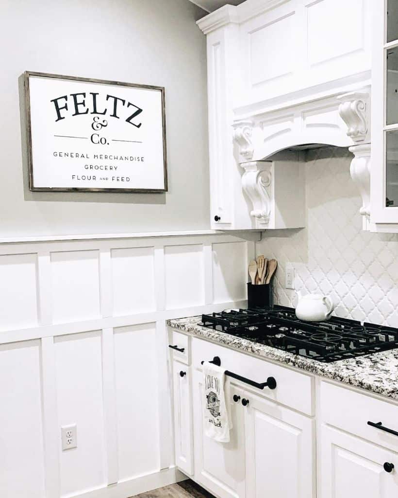 white kitchen hood french country kitchen black accents tile splashback texture walls