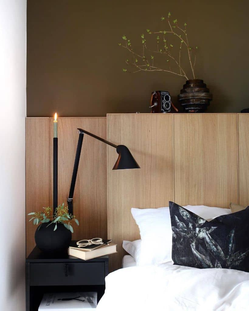 modern bedroom black desk lamp and candle