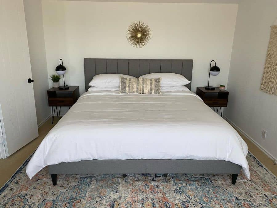 minimalist small master bedroom with gray bed