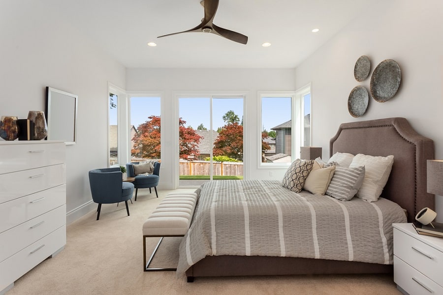 Modern bedroom with ceiling fan