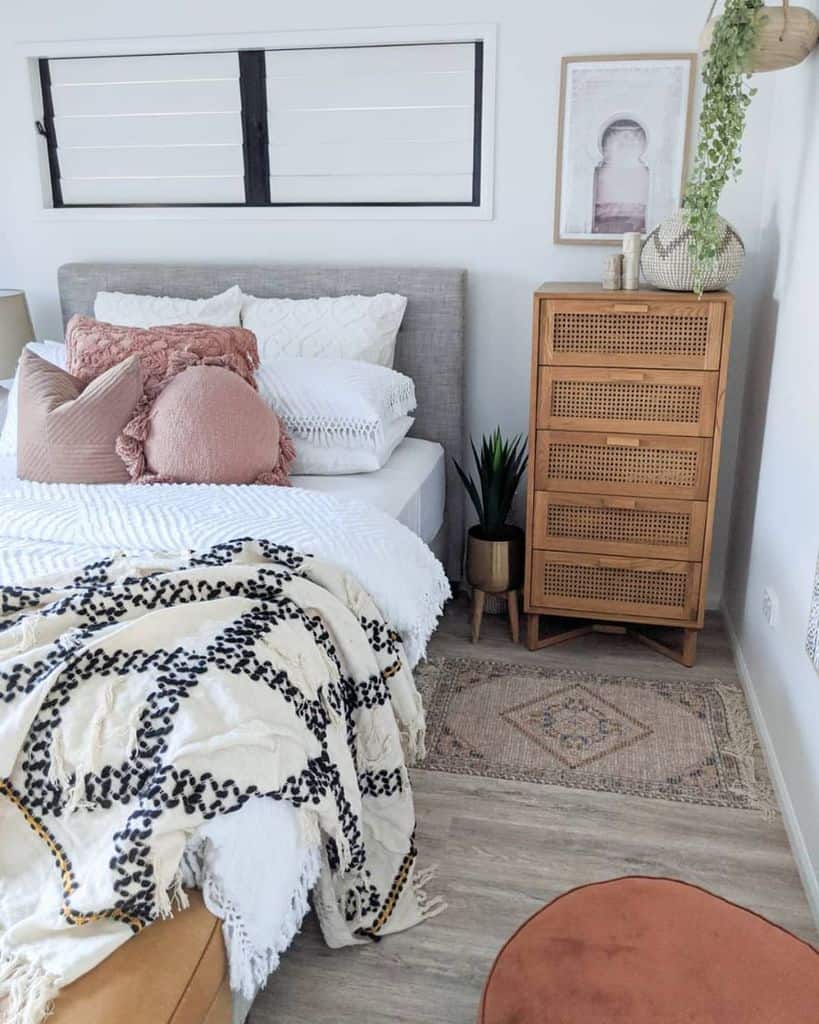 modern boho bedroom wood bedside table plant in gold pot