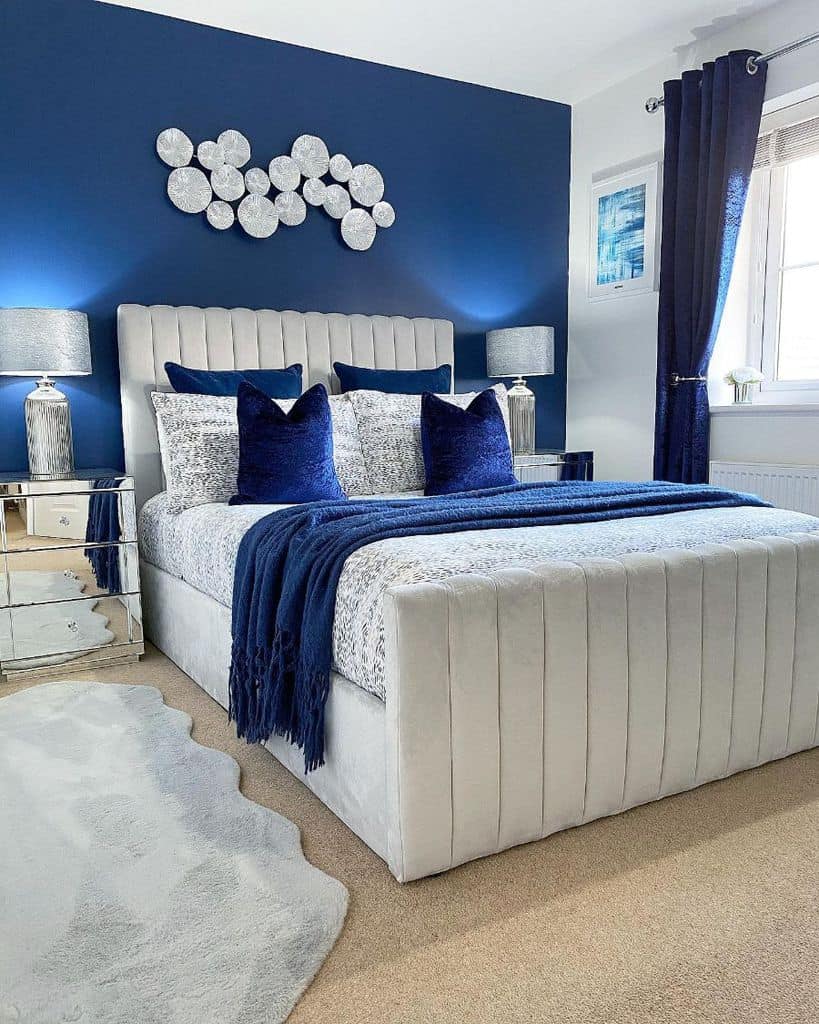 blue accent wall in modern bedroom 