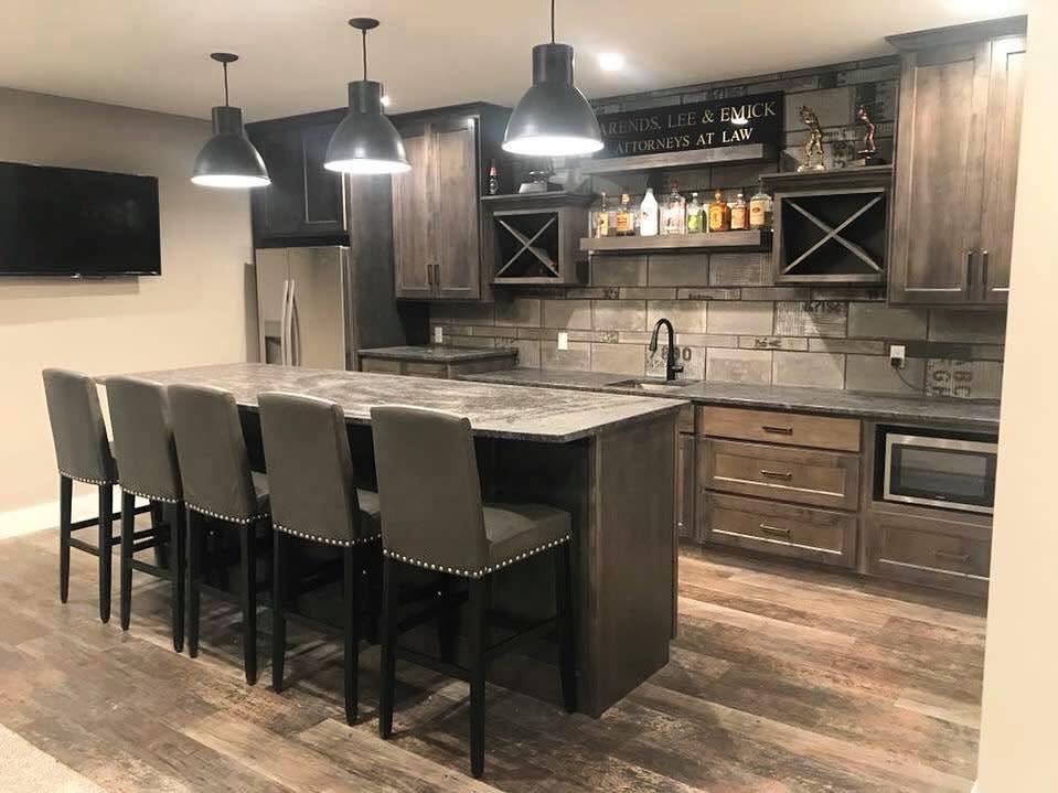 grey rustic kitchen with marble bench tops