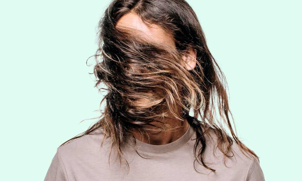 Geologie Promo Photo, man with long hair