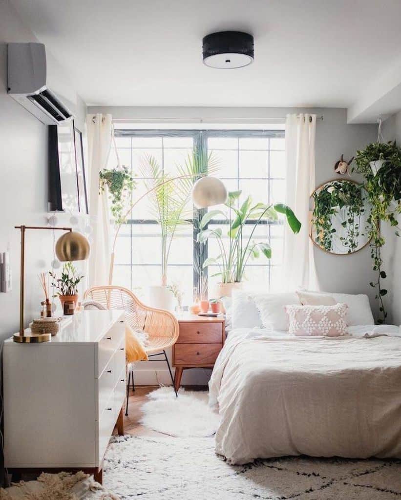 boho bedroom plants white cabinet gold lamps