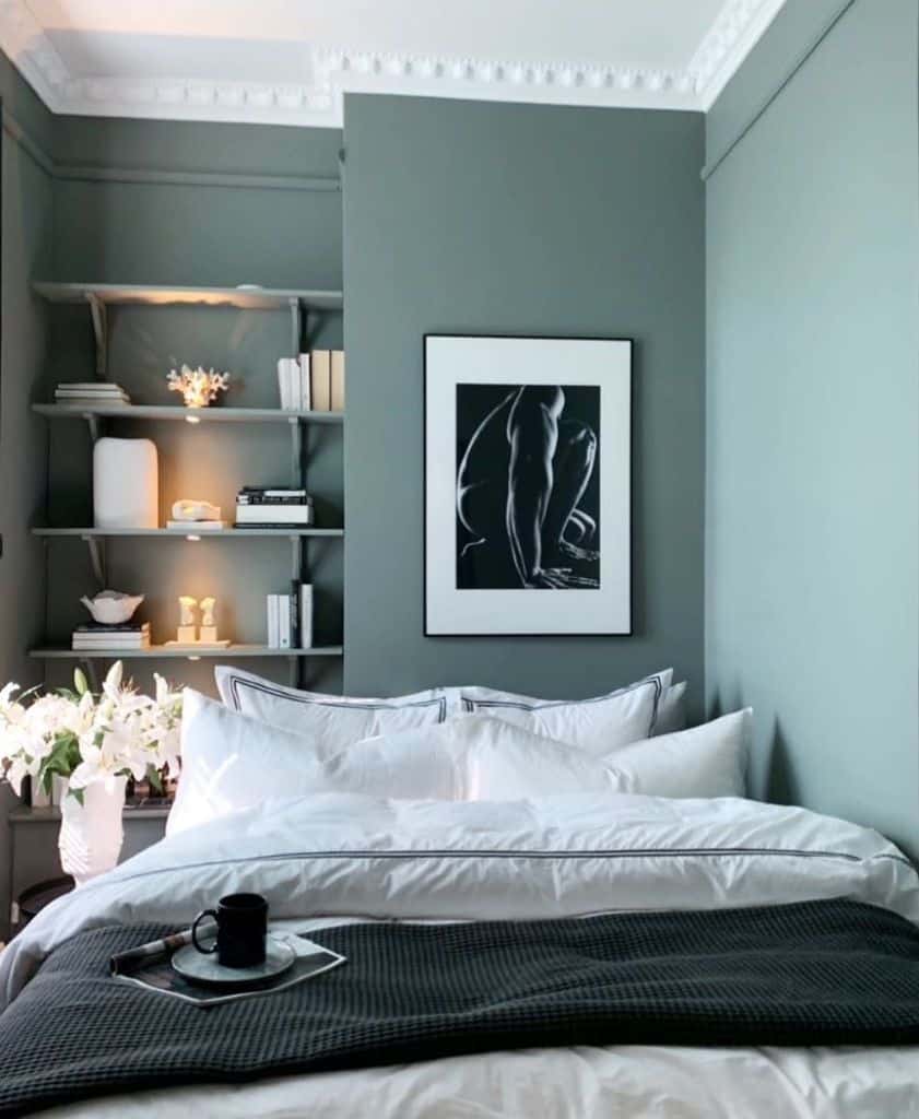 green bedroom built in shelving framed wall art