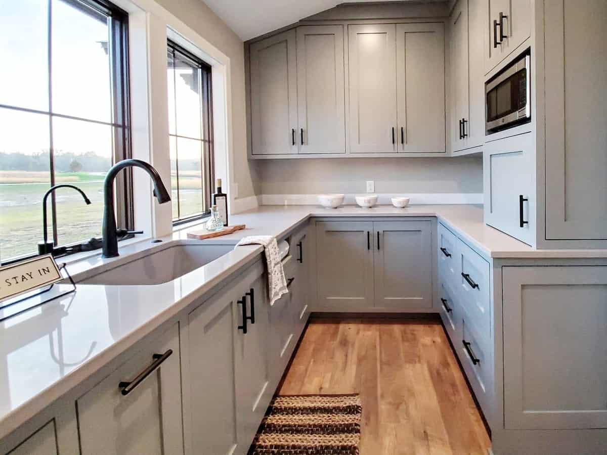 gray kitchen black accent wood flooring 