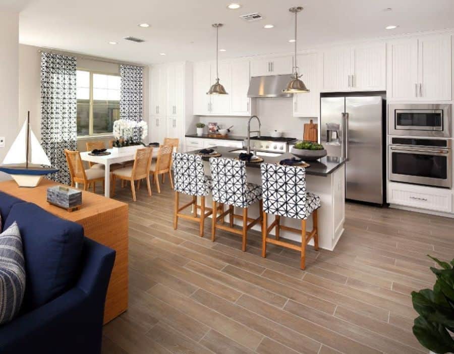 white cabinet kitchen in open plan house 