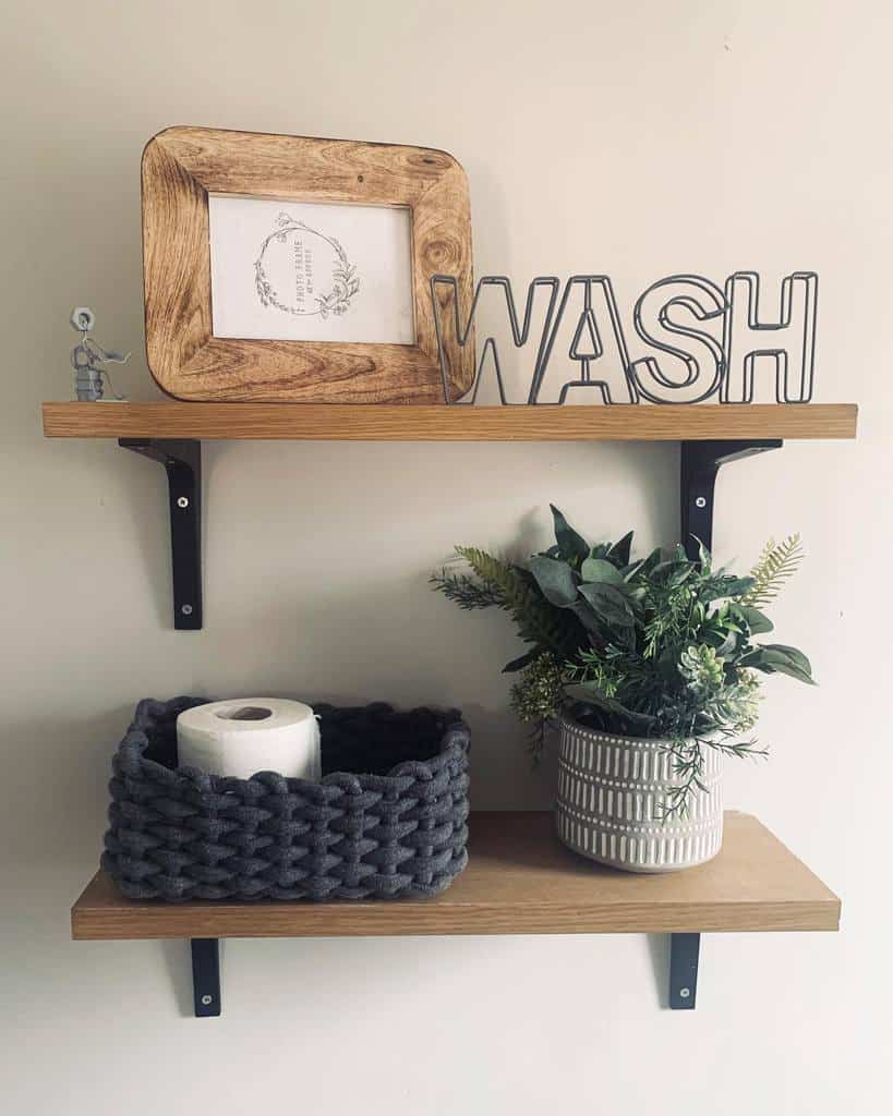 bathroom wood shelves plants toilet paper