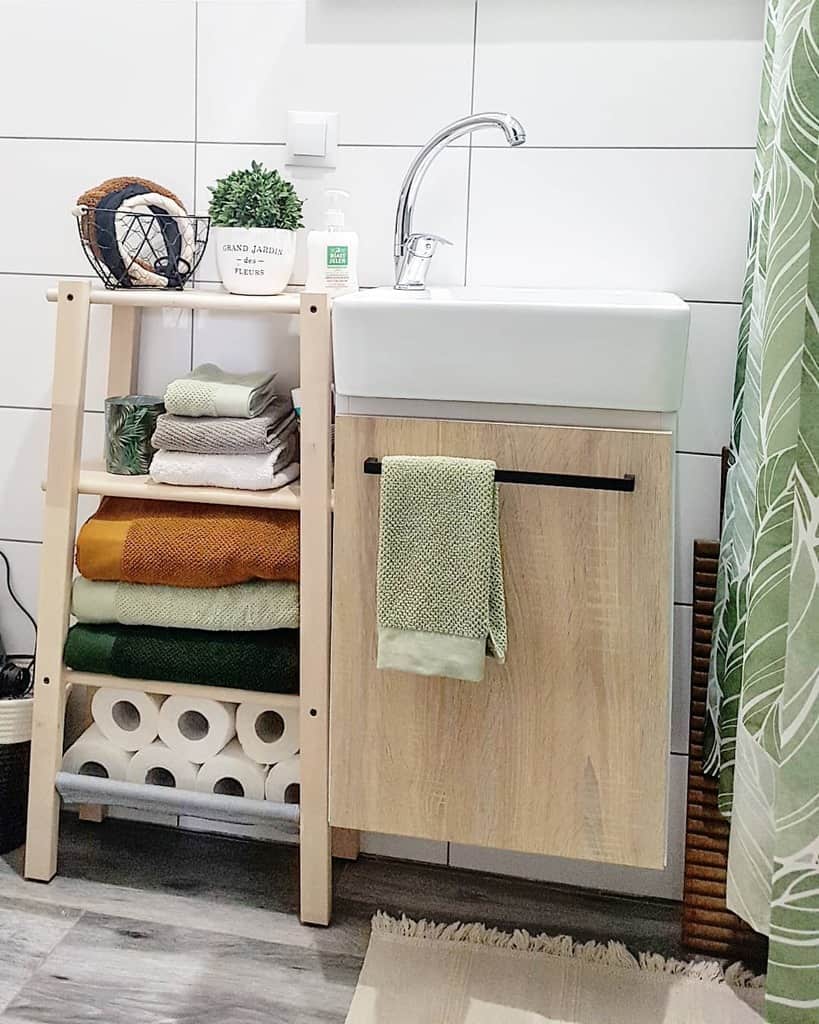 bathroom sink and cabinet with added storage 