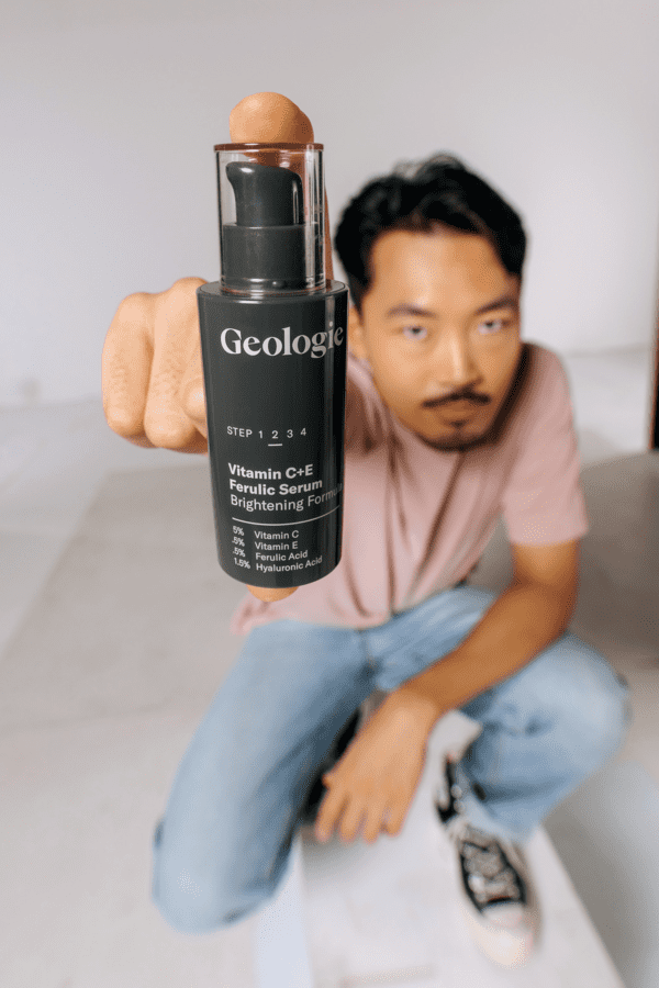 Man holding Geologie Vitamin C Serum